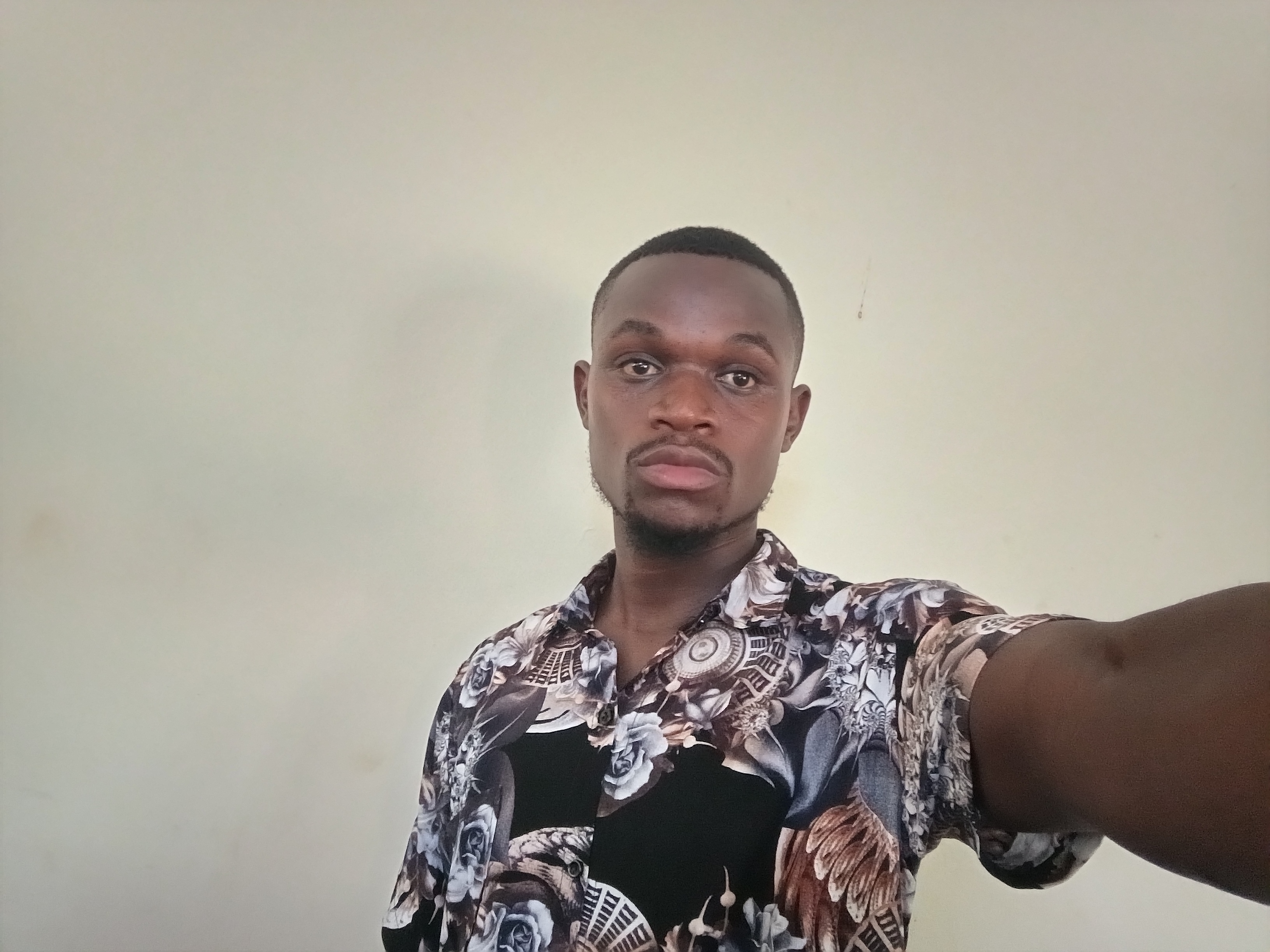 Paul Nyamawi - Graphic Designer & Front-End Developer